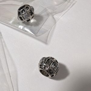 2 Pugster charms. NWT Silvertone & rhinestone design